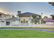 Elegant home with a well-manicured lawn, an enclosed yard, and a view of the iconic Stratosphere at 746 Oakmont Ave # 708, Las Vegas, NV 89109