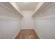 Walk-in closet with ample shelving and racks for organized storage with carpeted flooring at 746 Oakmont Ave # 708, Las Vegas, NV 89109