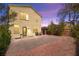 Spacious backyard with desert landscaping and a brick patio, perfect for outdoor entertaining at 7529 Earnshaw Avenue Ct, Las Vegas, NV 89179