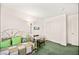 Bedroom featuring green carpet, twin bed and ample natural light with a closet at 7529 Earnshaw Avenue Ct, Las Vegas, NV 89179