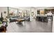 Bright and airy open-concept living space with a seamless flow to the kitchen with tile flooring at 7529 Earnshaw Avenue Ct, Las Vegas, NV 89179