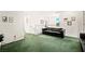 Bright upstairs living space with white trim and dark leather sofa at 7529 Earnshaw Avenue Ct, Las Vegas, NV 89179