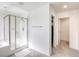 Bright bathroom featuring a glass shower and a soaking tub at 7579 Harwich Bay Ave, Las Vegas, NV 89179