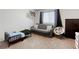 Bedroom with versatile furniture arrangement and ample natural light at 7579 Harwich Bay Ave, Las Vegas, NV 89179
