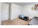 Bedroom featuring closet, sofa bed, and shelf for added storage at 7579 Harwich Bay Ave, Las Vegas, NV 89179