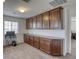 Versatile bonus room with extensive built-in cabinetry, ideal for a home office or storage solution at 7579 Harwich Bay Ave, Las Vegas, NV 89179