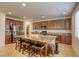 Spacious kitchen featuring a large central island with seating and abundant cabinet space at 7579 Harwich Bay Ave, Las Vegas, NV 89179