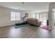 Spacious living area with wood-look floors and natural light at 7579 Harwich Bay Ave, Las Vegas, NV 89179
