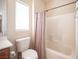 Bright bathroom featuring a shower/tub and toilet at 7726 Coast Jay St, North Las Vegas, NV 89084