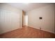 Neutral bedroom featuring wood flooring, closet, and wall mount capability for a TV at 7726 Coast Jay St, North Las Vegas, NV 89084