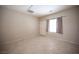 Spacious bedroom featuring tile floors, neutral paint, and natural light at 7726 Coast Jay St, North Las Vegas, NV 89084