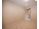 Neutral bedroom showcasing a blank canvas for personalization with tile flooring and ample lighting at 7726 Coast Jay St, North Las Vegas, NV 89084