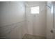 Walk in closet with wire shelving and tile flooring at 7726 Coast Jay St, North Las Vegas, NV 89084