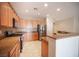 Beautiful kitchen featuring stainless steel appliances, tile floors, and granite countertops, great for meal prep and entertaining at 7726 Coast Jay St, North Las Vegas, NV 89084