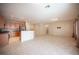 Well-appointed kitchen and adjacent living space offering plenty of room to spread out at 7726 Coast Jay St, North Las Vegas, NV 89084