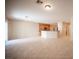 Spacious living area featuring an open floor plan connected to the kitchen, ideal for modern living at 7726 Coast Jay St, North Las Vegas, NV 89084