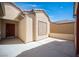 Private patio featuring a concrete pad and entry door at 7726 Coast Jay St, North Las Vegas, NV 89084