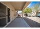 Covered patio with desert landscaping and a view of the backyard at 7726 Coast Jay St, North Las Vegas, NV 89084