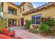 Backyard view with a patio, seating, and well-manicured plants adding a touch of elegance at 79 Rezzonico Dr, Henderson, NV 89011