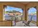 Relaxing balcony with neighborhood views and comfortable seating at 79 Rezzonico Dr, Henderson, NV 89011