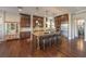 Spacious kitchen with dark wood cabinets, granite countertops, and stainless steel appliances at 79 Rezzonico Dr, Henderson, NV 89011