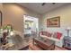 Cozy living room with view to entry featuring stylish decor and comfortable seating at 79 Rezzonico Dr, Henderson, NV 89011