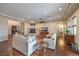 Spacious living room features a fireplace, hardwood floors and neutral tones at 79 Rezzonico Dr, Henderson, NV 89011