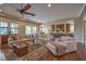 Spacious living room with hardwood floors, comfortable seating, and abundant natural light at 79 Rezzonico Dr, Henderson, NV 89011