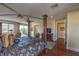 Comfortable bedroom with views from the attached terrace, hardwood floors, and a four poster bed at 79 Rezzonico Dr, Henderson, NV 89011