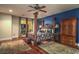 The spacious main bedroom includes a ceiling fan, balcony access, and elegant furnishings at 79 Rezzonico Dr, Henderson, NV 89011