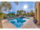 Resort style pool with lounge seating and umbrellas at 79 Rezzonico Dr, Henderson, NV 89011