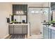 Modern bathroom featuring a walk-in glass shower, double vanity, and stylish tile accents at 824 Weston Ridge St, Henderson, NV 89011