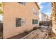 Side of home view with tidy landscaping and a peaceful backyard setting at 832 Clear Diamond Ave, Las Vegas, NV 89123