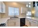 Kitchen featuring white cabinetry, stainless steel appliances, and a modern sink at 832 Clear Diamond Ave, Las Vegas, NV 89123