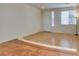 Inviting living room featuring stylish flooring and bright front door at 832 Clear Diamond Ave, Las Vegas, NV 89123