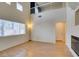 Spacious living room with modern flooring and high ceilings at 832 Clear Diamond Ave, Las Vegas, NV 89123