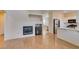 Open living space with fireplace, wine cooler, and kitchen at 832 Clear Diamond Ave, Las Vegas, NV 89123