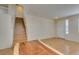 Inviting living room featuring stairs and bright front door at 832 Clear Diamond Ave, Las Vegas, NV 89123