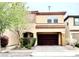 Charming two-story home features a well-maintained front yard and a two-car garage at 8477 Orly Ave, Las Vegas, NV 89143