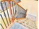 Staircase with carpeted steps and a decorative wrought iron railing at 8477 Orly Ave, Las Vegas, NV 89143