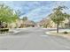 Picturesque street view in a quiet neighborhood with tree-lined sidewalks and well-maintained homes at 8477 Orly Ave, Las Vegas, NV 89143