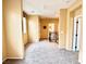 Spacious upstairs landing area with neutral carpet, and multiple entry doors at 8477 Orly Ave, Las Vegas, NV 89143