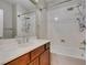 Bathroom features a shower-tub combination and a vanity at 8743 Mount Mira Loma Ave, Las Vegas, NV 89178