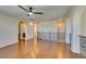 Bonus room with wood laminate floors, arches, and wrought iron railing at 8743 Mount Mira Loma Ave, Las Vegas, NV 89178