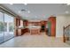 Bright kitchen featuring an island, stainless appliances, and a sliding door to the outdoor patio at 8743 Mount Mira Loma Ave, Las Vegas, NV 89178
