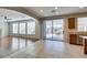 Open concept kitchen and living area, plenty of natural light, stainless steel appliances and backyard access at 8743 Mount Mira Loma Ave, Las Vegas, NV 89178