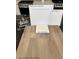 Showcasing luxury vinyl plank flooring, sleek chrome faucet, and upgraded Elkins White cabinets with Alabaster paint at 9135 Eagle Ford St, Las Vegas, NV 89113