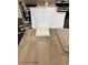 Showcasing luxury vinyl plank flooring, sleek chrome faucet, and upgraded Elkins White cabinets with Alabaster paint at 9135 Eagle Ford St, Las Vegas, NV 89113