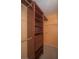 Walk-in closet with custom shelving and drawers for ample storage at 9323 W Rochelle Ave, Las Vegas, NV 89147