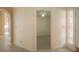Foyer features a decorative stained-glass window, tile flooring, and an arched doorway to adjoining rooms at 9323 W Rochelle Ave, Las Vegas, NV 89147